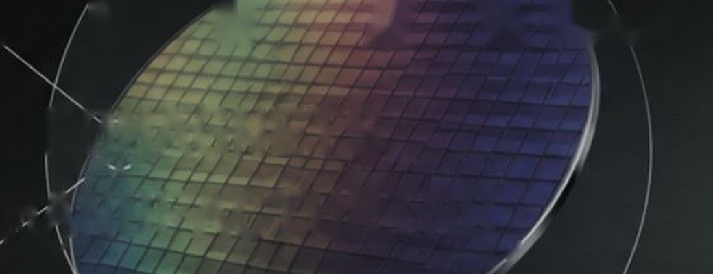 Legal notice of the MagnetFab website – semiconductor wafer illustrating wafer-level micromagnets
